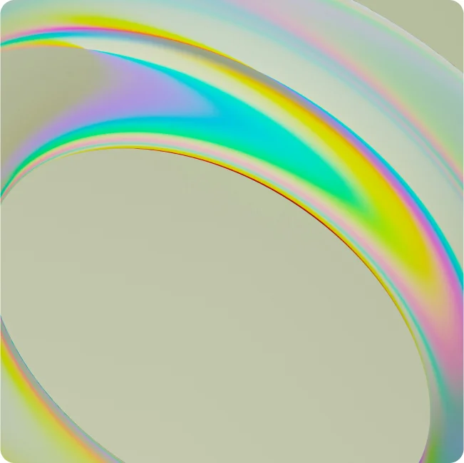 Effets lumineux d’arc-en-ciel sur une surface courbe, créant un effet de dégradé chromatique.